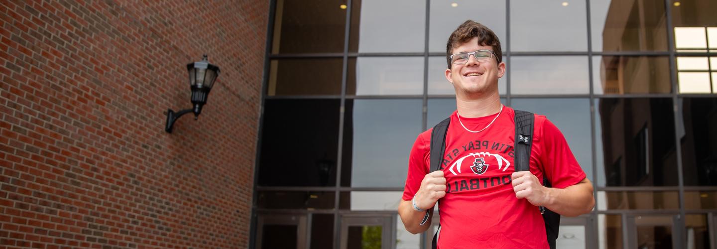 Student with their backpack