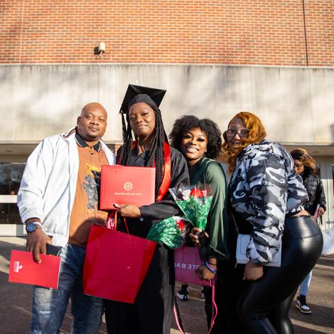 Family celebration the graduation of their student